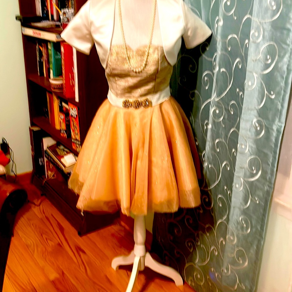 This dress is a little beautiful dress with a belt and jacket
